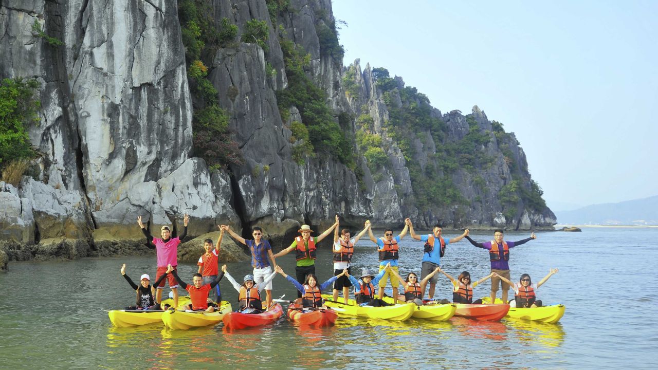 Cave tour - kayaking - dinner on boat in Ha Long
